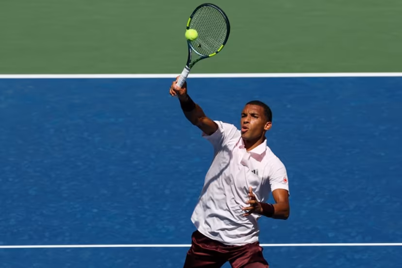 Canada's Felix Auger-Aliassime hits a return to Russia's Karen Khachanov during their men's singles second round tennis match on day five of the US Open tennis tournament at the USTA Billie Jean King National Tennis Center in New York City on September 3, 2026. TIMOTHY A. CLARY / AFP