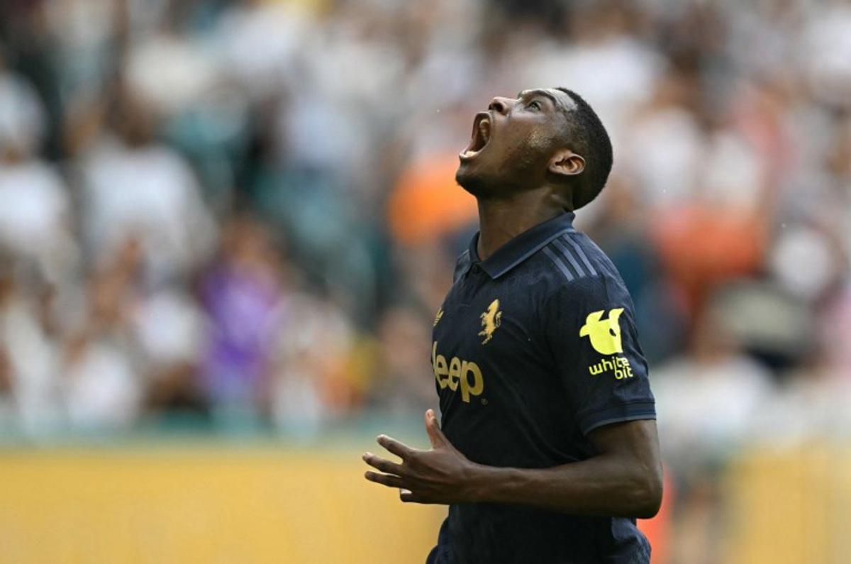 Juventus' French forward #20 Randal Kolo Muani reacts after missing an opportunity to score during the FIFA Club World Cup 2025 round of 16 football match between Spain's Real Madrid and Italy's Juventus at the Hard Rock Stadium in Miami on July 1, 2025. PATRICIA DE MELO MOREIRA / AFP