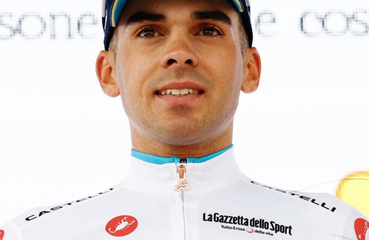 XDS Astana Team Uruguayan rider Guillermo Silva wearing the best young rider's white jersey (Maglia Bianca) celebrates on the podium after the 3nd stage of the Giro d'Italia 2026 - Tour of Italy cycling race between Plovdiv and Sofia, Bulgaria, on May 10, 2026. Luca Bettini / AFP