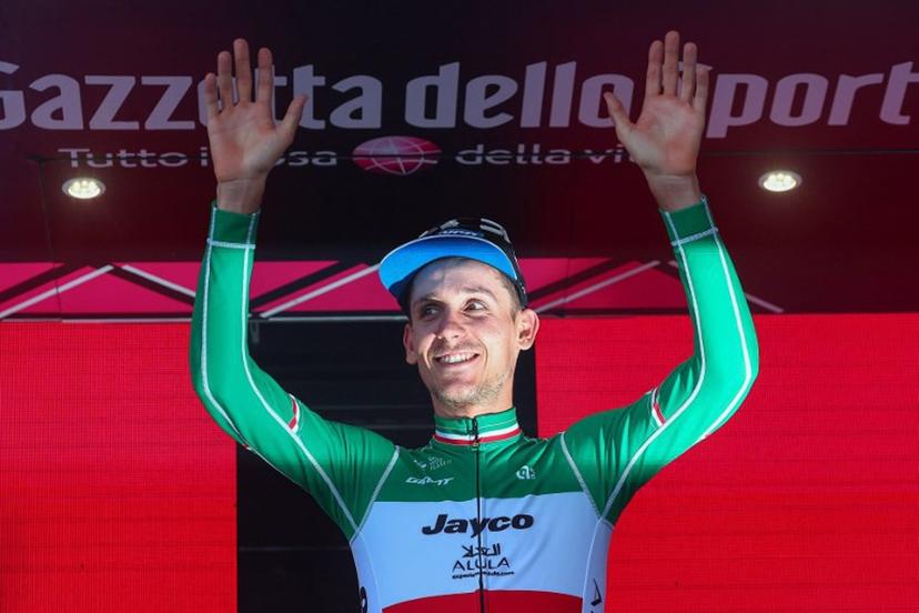 Team Jayco AlUla's Filippo Zana rider celebrates on the podium after winning the eighteenth stage of the Giro d'Italia 2023 cycling race, 161 km between Oderzo and Val di Zoldo, on May 25, 2023. . Luca Bettini / AFP
