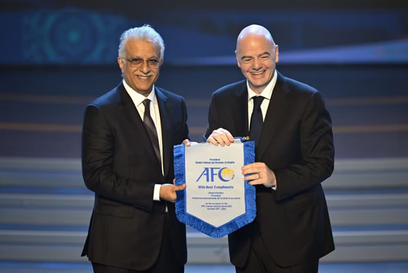 FIFA president Gianni Infantino (R) poses with Sheikh Salman bin Ibrahim al-Khalifa (L), president of the Asian Football Confederation (AFC), during the AFC Annual Awards 2023 ceremony in Seoul on October 29, 2024. JUNG YEON-JE / AFP