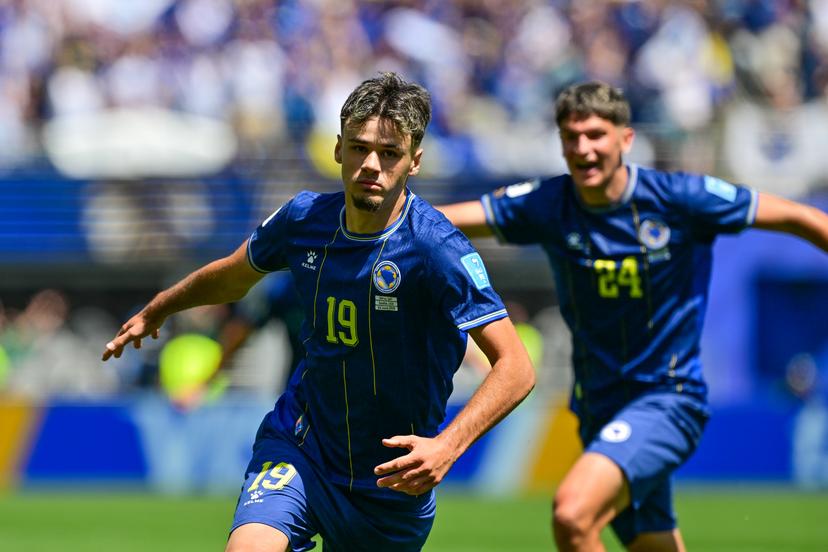 Bosnia and Herzegovina's Kerim Alajbegovic celebrates after scoring during a soccer game between Bosnia and Herzegovina and Qatar, on Wednesday 24 June 2026 in Seattle, the third and last day in the group stage, in group B of the FIFA World Cup 2026 in the United States of America. BELGA PHOTO DIRK WAEM