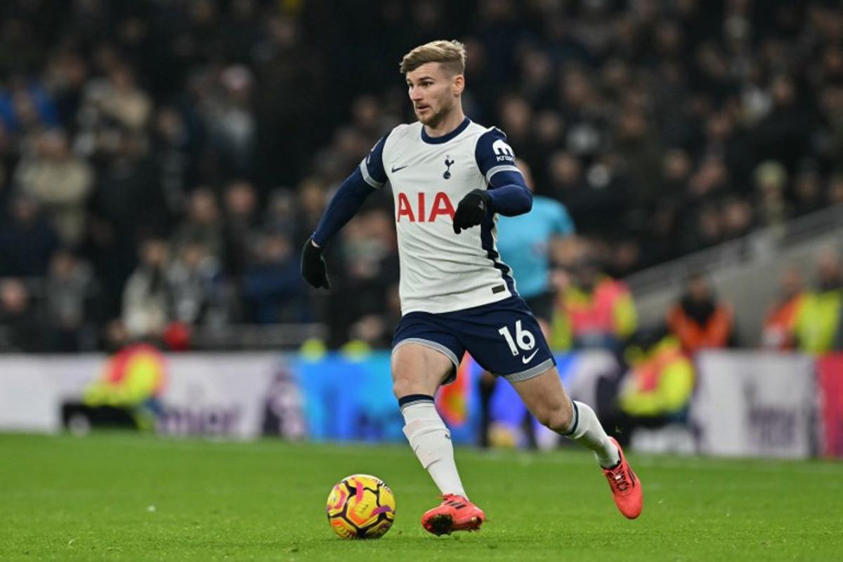 Tottenham Hotspur's German striker #16 Timo Werner runs with the ball during the English Premier League football match between Tottenham Hotspur and Wolverhampton Wanderers at the Tottenham Hotspur Stadium in London, on December 29, 2024. Glyn KIRK / AFP