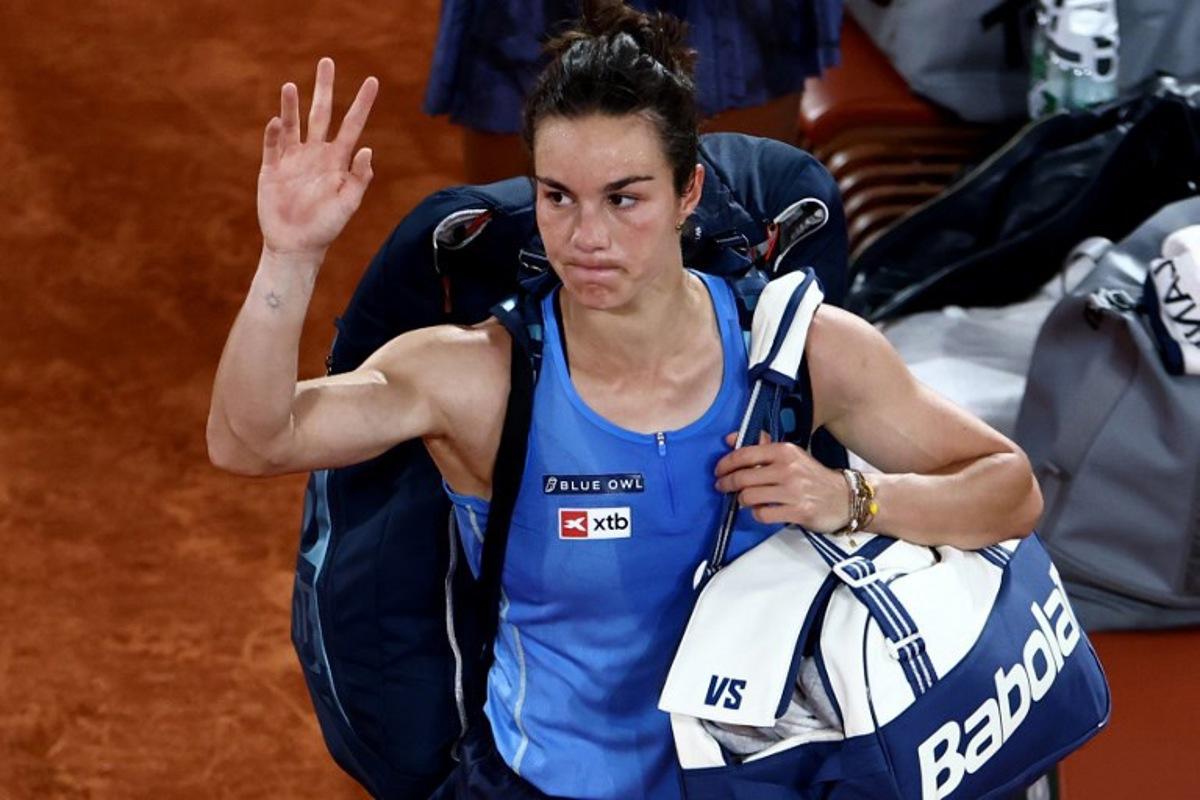 France's Lois Boisson leaves after losing her women's singles semi-final match against US Coco Gauff on day 12 of the French Open tennis tournament on Court Philippe-Chatrier at the Roland-Garros Complex in Paris on June 5, 2025. Thibaud MORITZ / AFP
