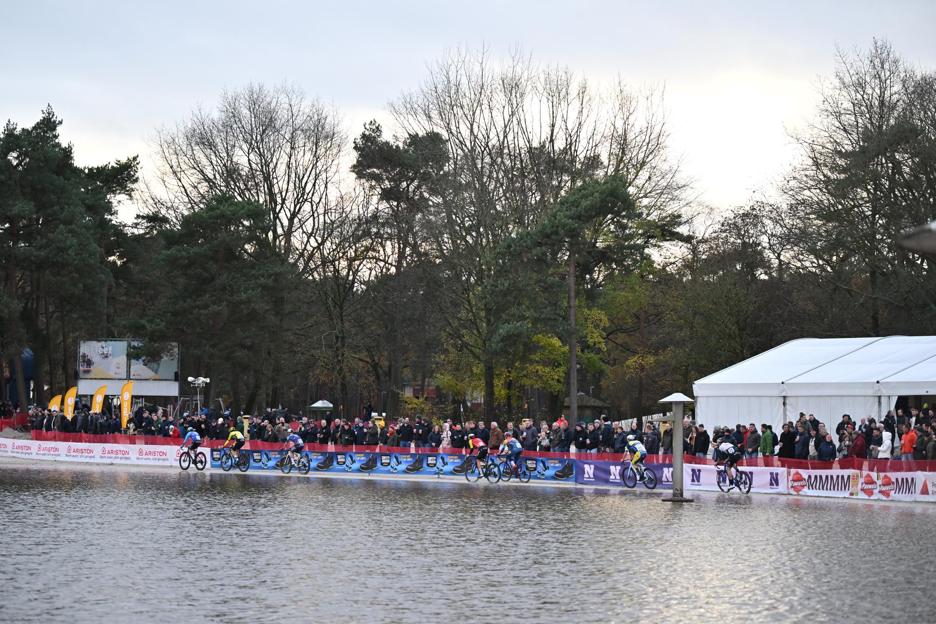 the pack of the riders pictured in action during the 'Boonen and Friends' cyclocross cycling event for charity, Saturday 29 November 2025 in Mol. BELGA PHOTO LUC CLAESSEN