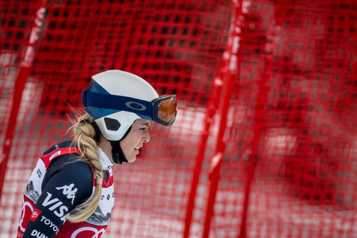 US' Lindsey Vonn reacts after crashing as she competes in the women's downhill race part of the FIS Alpine Ski World Cup 2025-2026, in Crans Montana, Switzerland, on January 30, 2026. Fabrice COFFRINI / AFP