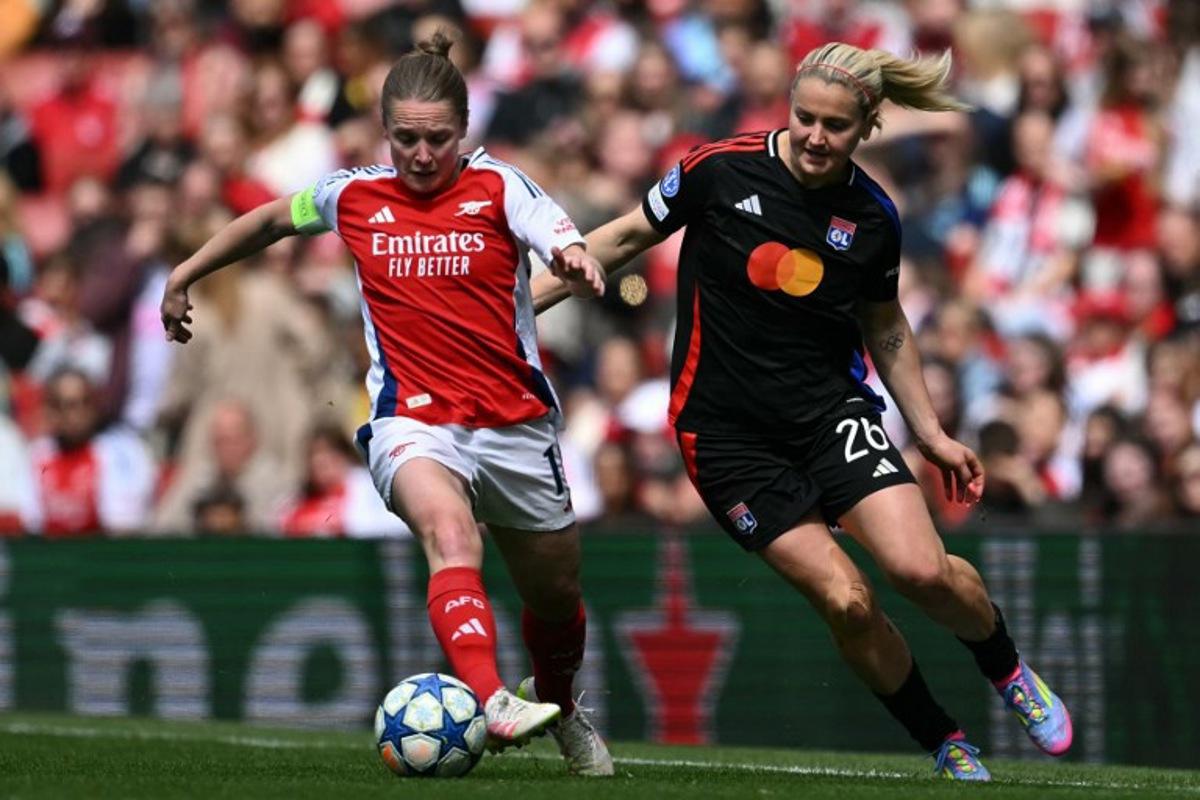 Arsenal's Scottish midfielder #10 Kim Little (L) vies with Lyon's US midfielder #26 Lindsey Heaps (R) during the UEFA Women's Champions League semi-final first leg football match between Arsenal and Lyon, at the Arsenal Stadium in north London on April 19, 2025. JUSTIN TALLIS / AFP