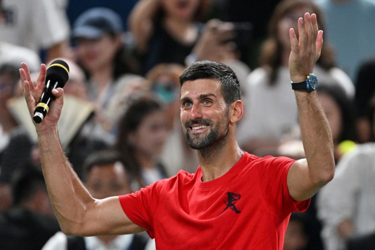 Serbia's Novak Djokovic celebrates winning his quarter-final men's singles match against Belgium's Zizou Bergs at the Shanghai Masters tennis tournament in Shanghai on October 9, 2025. Hector RETAMAL / AFP