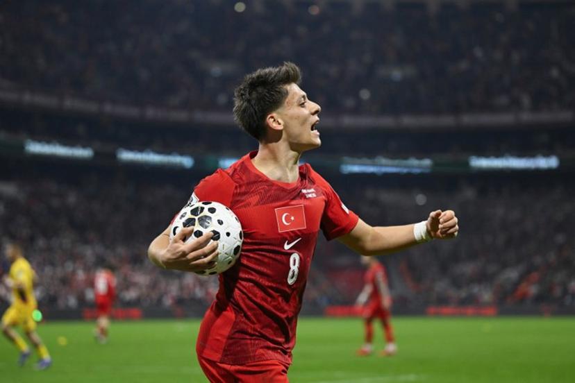 Turkey's midfielder #08 Arda Guler reacts during the play-off FIFA World Cup 2026 European qualification knockout semi-final football match between Turkey and Romania at Besiktas Park stadium, in Istanbul on March 26, 2026. YASIN AKGUL / AFP