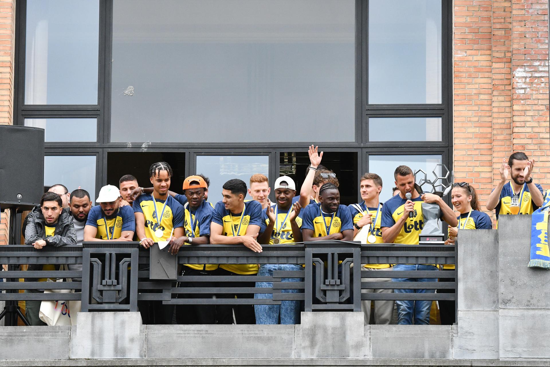 Union's players pictured during the official ceremony organized at the Forest town hall, on the occasion of the Belgian champion title won by Union Saint-Gilloise, on Monday 26 May 2025. Yesterday, Union Saint-Gilloise won the 2024-2025 'Jupiler Pro League' first division of the Belgian championship. BELGA PHOTO JILL DELSAUX
