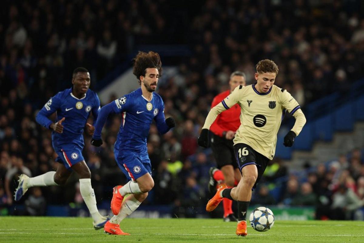 Barcelona's Spanish midfielder #16 Fermin Lopez runs with the ball during the UEFA Champions League league-phase football match between Chelsea and Barcelona at Stamford Bridge in London on November 25, 2025. Adrian Dennis / AFP