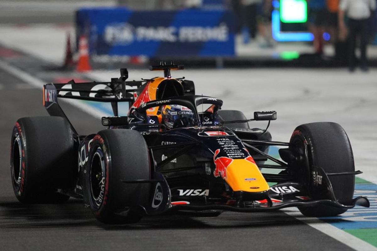 Red Bull Racing's Dutch driver Max Verstappen drives into the pit lane during the qualifying session ahead of the Formula One Singapore Grand Prix at the Marina Bay Street Circuit in Singapore on October 10, 2026. Ng Han Guan / POOL / AFP