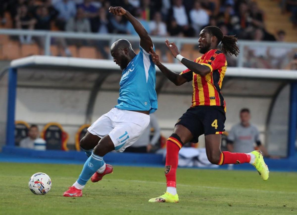Napoli's Belgian forward #11 Romelu Lukaku fights for the ball with Lecce's Angolan defender #4 Kialonda Gaspar during the Italian Serie A football match between Lecce and Napoli at the comunal stadium in Lecce on May 3, 2025. CARLO HERMANN / AFP