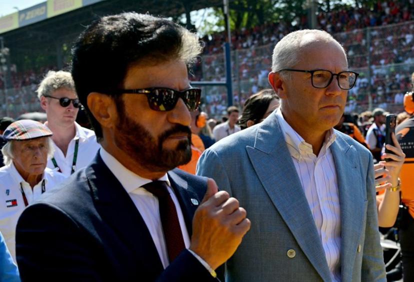FIA President Mohammed Ben Sulayem (L) walks with Italian CEO of the Formula One Group Stefano Domenicali ahead of the Italian Formula One Grand Prix at the Autodromo Nazionale Monza circuit in Monza, northern Italy on September 6, 2026. Andrej ISAKOVIC / AFP