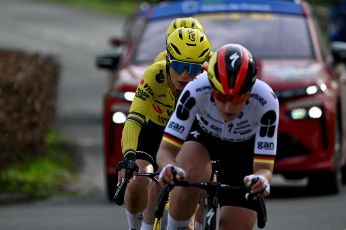 FDJ United-SUEZ's German rider Franziska Koch cycles in a breakway ahead of Team Visma - Lease a Bike's French rider Pauline Ferrand-Prévot during the 6th edition of the Women Paris-Roubaix one-day classic cycling race, 143.1 km between Denain and Roubaix, northern France, on April 12, 2026. NICOLAS TUCAT / AFP