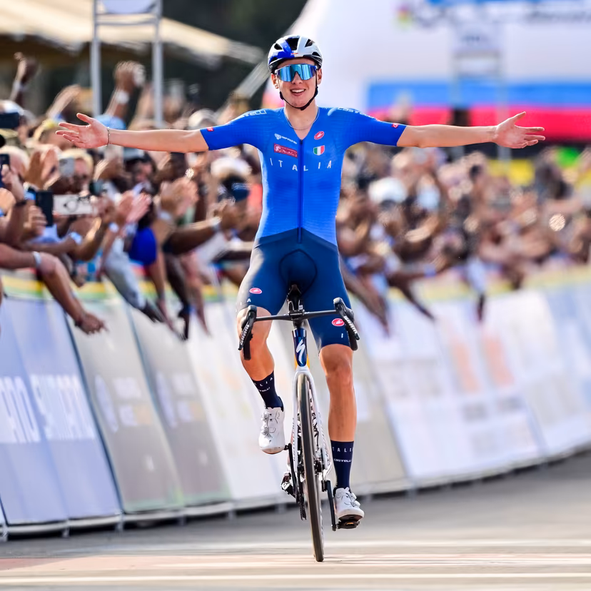 Italian Lorenzo Finn celebrates as he crosses the finish line to win the u23 men road race (164,6 km) at the cycling road World Championships in Kigali, Rwanda, Friday 26 September 2025. The 2025 UCI Road World Championships take place from 21 to 28 September in Kigali, Rwanda. BELGA PHOTO DIRK WAEM