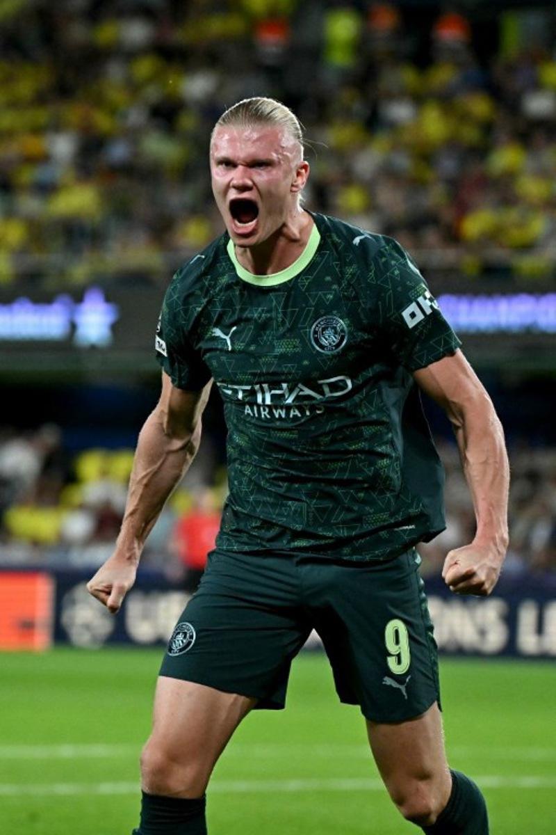Manchester City's Norwegian forward #09 Erling Braut Haaland celebrates scoring his team's first goal during the UEFA Champions League league phase day 3 football match between Villarreal CF and Manchester City at La Ceramica Stadium in Vila-real on October 21, 2025. JAVIER SORIANO / AFP
