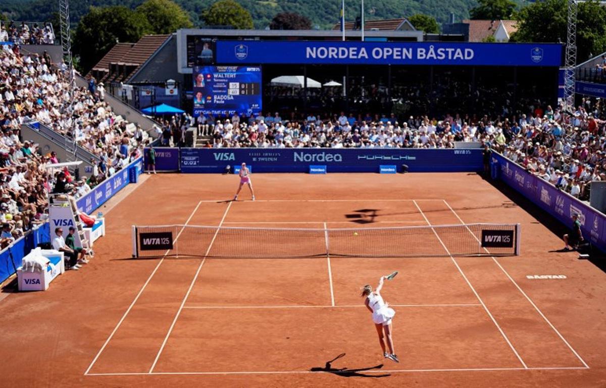 Switzerland's Simona Waltert (back) plays against Spain's Paula Badosa during the women's singles final match at the WTA Nordea Open tennis tournament at the Centre Court in Bastad, Sweden on July 11, 2026. Bjorn LARSSON ROSVALL / TT News Agency / AFP
