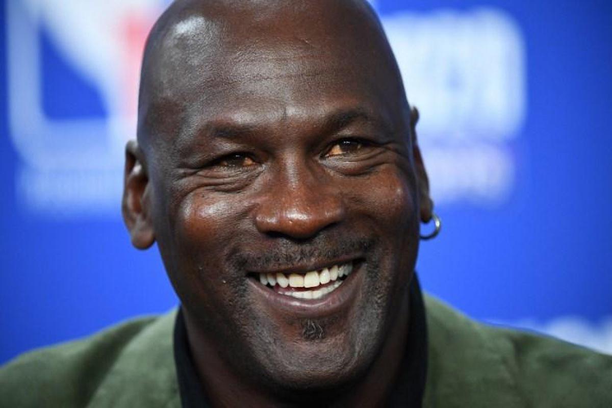 Former NBA star and owner of Charlotte Hornets team Michael Jordan looks on as he addresses a press conference ahead of the NBA basketball match between Milwaukee Bucks and Charlotte Hornets at The AccorHotels Arena in Paris on January 24, 2020. FRANCK FIFE / AFP