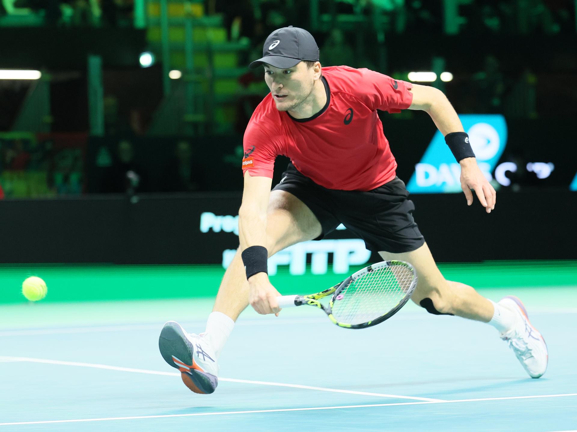 Belgian Raphael Collignon pictured in action during a tennis match against Italian Berrettini, the first in the Davis Cup semifinals between Belgium and Italy, in Bologna, Italy, on Friday 21 November 2025. The Davis Cup top eight Finals take place in Bologna from November 18 to 23. BELGA PHOTO BENOIT DOPPAGNE