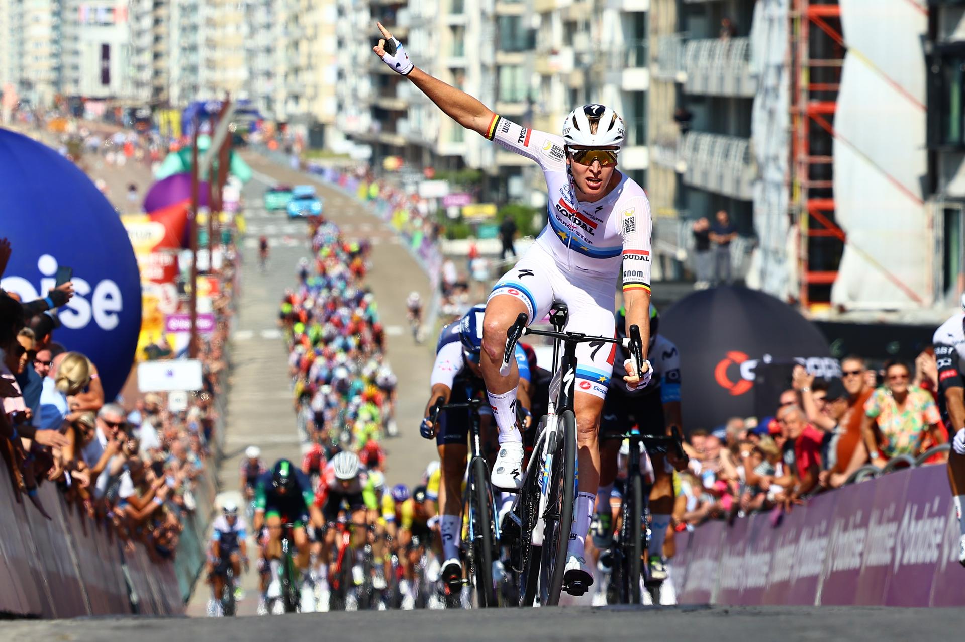 Belgian Jasper Philipsen of Alpecin-Deceuninck celebrates as he crosses the finish line to win the first stage of the Baloise Belgium Tour cycling race, 198km from Merelbeke-Melle to Knokke-Heist, Wednesday 18 June 2025. The Baloise Belgium Tour takes place from 18 to 22 June. BELGA PHOTO DAVID PINTENS