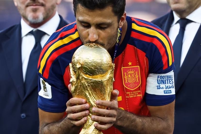 Spain's midfielder #16 Rodri kisses the trophy after winning the 2026 World Cup football tournament final match between Spain and Argentina at the New York/New Jersey Stadium in East Rutherford on July 19, 2026. FRANCK FIFE / AFP