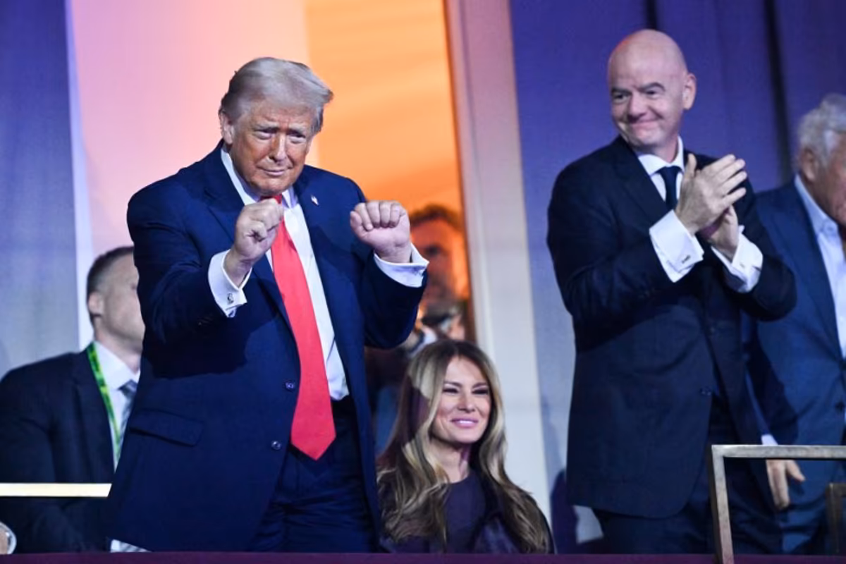 US President Donald Trump dances as US Musical Group The Village People perform the song "YMCA" during the draw for the 2026 FIFA Football World Cup taking place in the US, Canada and Mexico, at the Kennedy Center, in Washington, DC, on December 5, 2025. Mandel NGAN / POOL / AFP