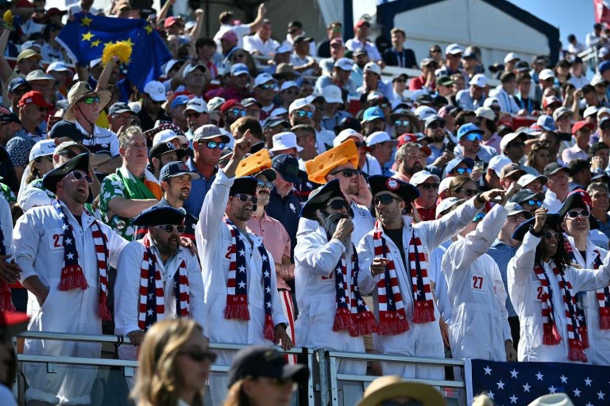 Fans of the US team are seen as US President Donald Trump attends the 45th Ryder Cup golf competition at Bethpage Black Course in Farmingdale, New York, on September 26, 2025. Mandel NGAN / POOL / AFP