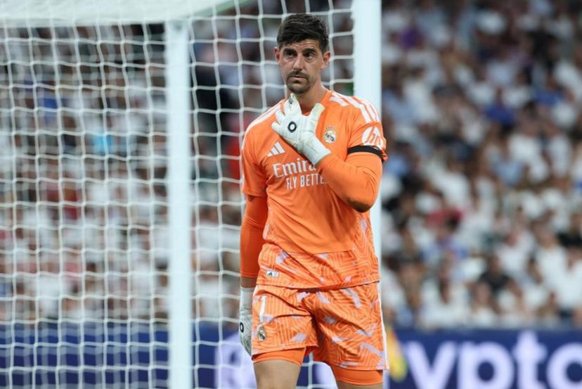 Real Madrid's Belgian goalkeeper #01 Thibaut Courtois gestures after recovering from an injury during the UEFA Champions League first round day 1 football match between Real Madrid and Inter Milan at the Santiago Bernabeu stadium in Madrid on September 8, 2026. Thomas COEX / AFP