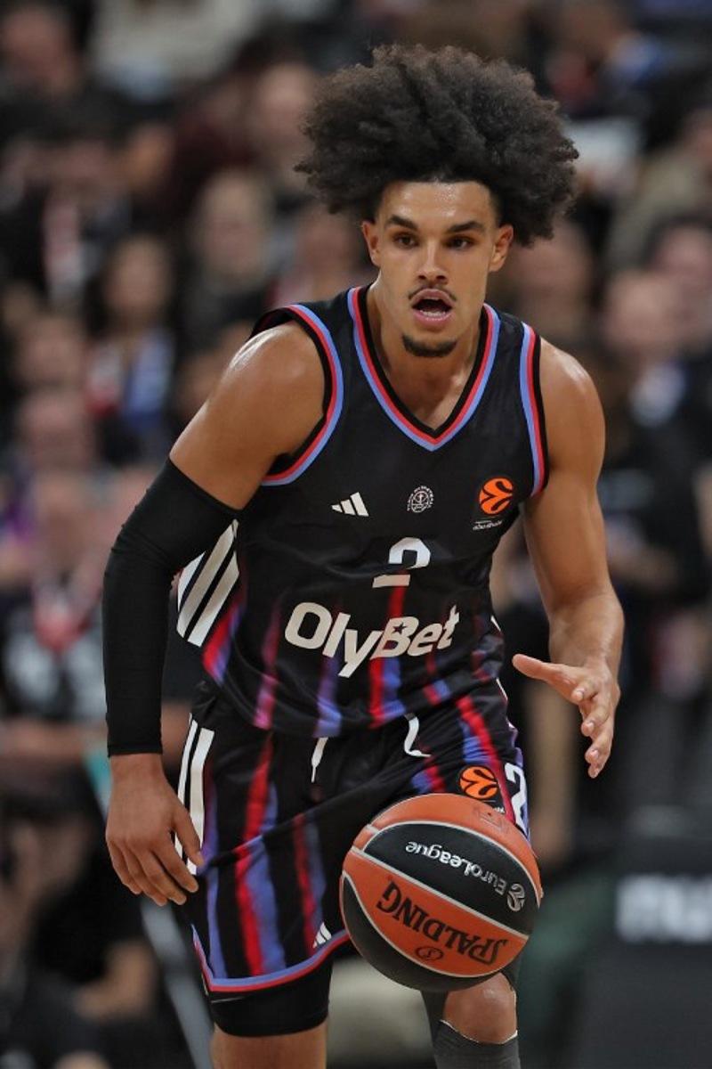Paris Basketball's French-Algerian guard #02 Nadir Hifi runs with the ball during the Euroleague basketball match between Paris Basketball and Virtus Bologna at the Adidas Arena, in Paris, on October 9, 2025. Anne-Christine POUJOULAT / AFP