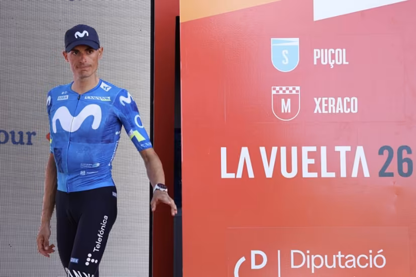 New overall race leader Team Movistar's Spanish rider Enric Mas enters the podium after the eighth stage of the Vuelta a Espana 2026, a 171 km race between Pucol and Xeraco on August 29, 2026. Previous race leader Tadej Pogacar pulled out of the Vuelta a Espana on Saturday after a heavy fall 31km from the finish of a flat stage eight left him with shoulder and face injuries. Pogacar of Team UAE has won five Tour de France titles and a Giro d'Italia and was targetig his first overall victory on the Spanish 21-day race. Josep LAGO / AFP