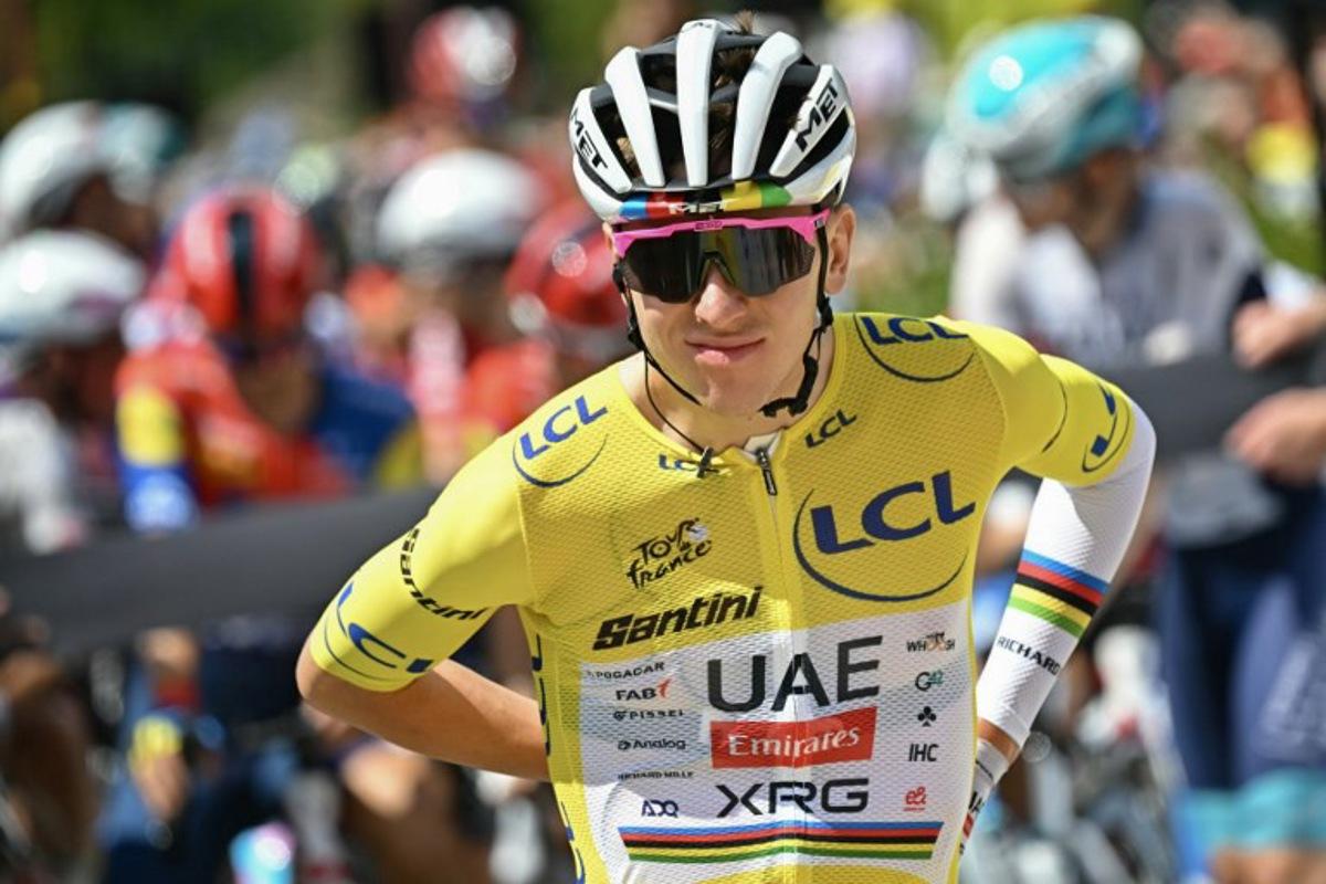 UAE Team Emirates - XRG team's Slovenian rider Tadej Pogacar wearing the overall leader's yellow jersey awaits the start of the 18th stage of the 112th edition of the Tour de France cycling race, 171.5 km between Vif and Courchevel Col de la Loze, in the Alps, southeastern France, on July 24, 2025. Loic VENANCE / AFP