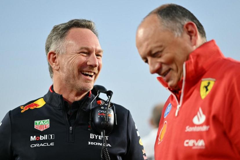 Red Bull Racing's British team principal and CEO Christian Horner (L) and Ferrari's French team principal Frédéric Vasseur talk at the grid before the sprint race ahead of the Qatari Formula One Grand Prix at the Lusail International Circuit in Lusail, north of Doha, on November 30, 2024. Andrej ISAKOVIC / AFP