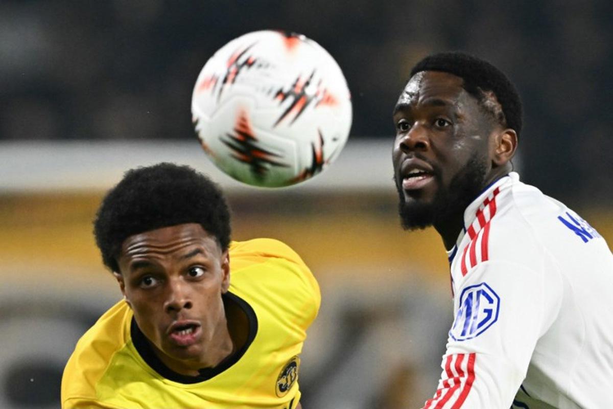 Young Boys' Swiss midfielder #10 Alvyn Sanches (L) fights for the ball with Lyon's Belgian midfielder #05 Orel Mangala during the Europa League 1st round day 7 football match between Young Boys and Olympique Lyonnais (OL) at Stadion Wankdorf in Bern on January 22, 2026. Sébastien BOZON / AFP
