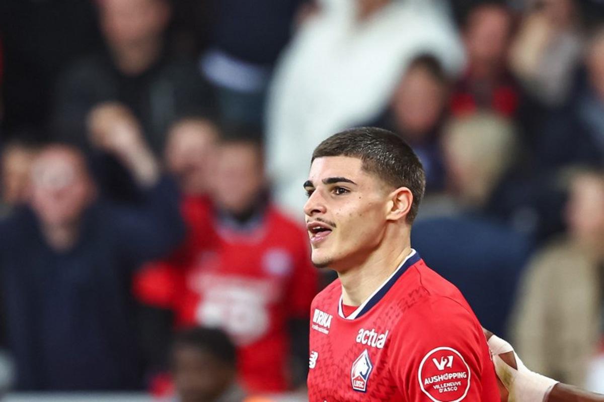 Lille's Belgian forward #19 Matias Fernandez-Pardo celebrates scoring the opening goal during the French L1 football match between Lille LOSC and Lens (RCL) at Stade Pierre-Mauroy in Villeneuve-d'Ascq, northern France on March 30, 2025. Sameer Al-DOUMY / AFP