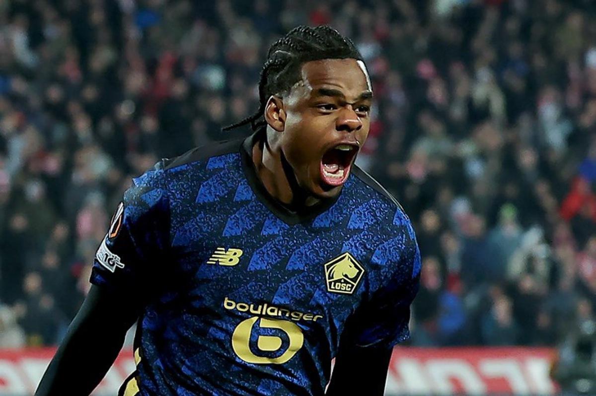 Lille's Belgian defender #03 Nathan Ngoy celebrates celebrates scoring his team's second goal during the UEFA Europa League - knockout round play-off second leg - football match between FK Crvena Zvezda Beograd (Red Star Belgrade) and LOSC Lille at the "Rajko Mitic" stadium in Belgrade on February 26, 2026. Pedja Milosavljevic / AFP