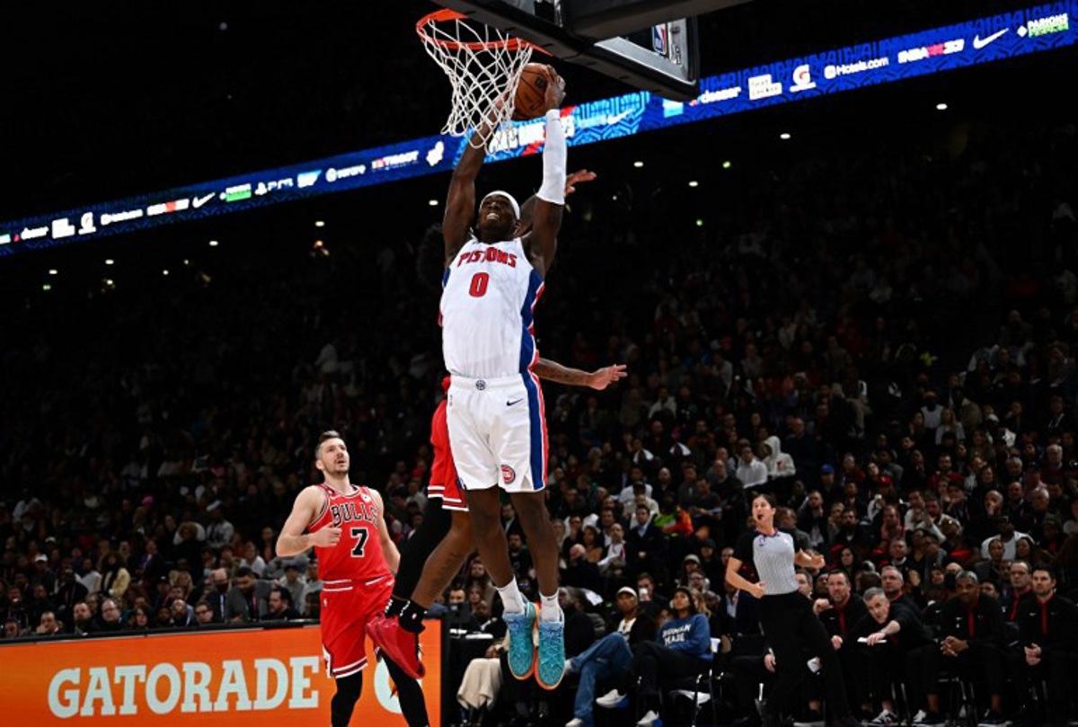 Detroit Pistons' US power forward Jalen Duren jumps to score during the 2023 NBA Paris Games basketball match between Detroit Pistons and Chicago Bulls at the Arena stadium in Paris on January 19, 2023. Anne-Christine POUJOULAT / AFP