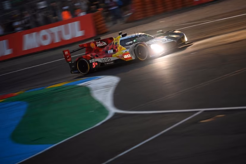 BMW M Team WRT's German driver #20 Rene Rast steers his hypercar during the 2025 Le Mans 24 hour endurance race, at the Le Mans circuit, in north-western France on June 14, 2025. JEAN-FRANCOIS MONIER / AFP