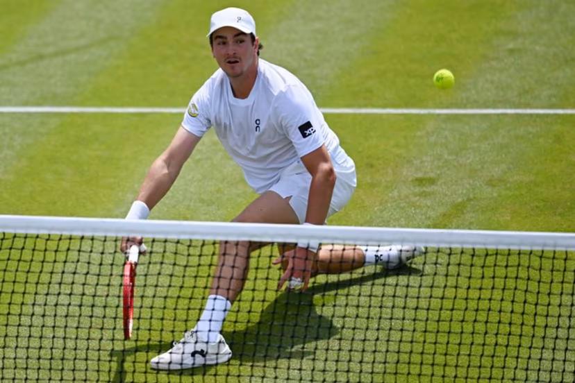 Brazil's Joao Fonseca returns to Russia's Roman Safiullin during their men's singles third round tennis match on the fifth day of the 2026 Wimbledon Championships at The All England Lawn Tennis and Croquet Club in Wimbledon, southwest London, on July 3, 2026. Kirill KUDRYAVTSEV / AFP