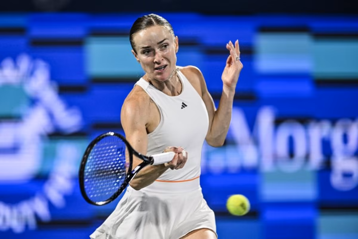 Ukraine's Elina Svitolina hits a return to US' Jessica Pegula during their women's singles final match at the Dubai Duty Free Tennis tournament in Dubai on February 21, 2026. Ryan Lim / AFP