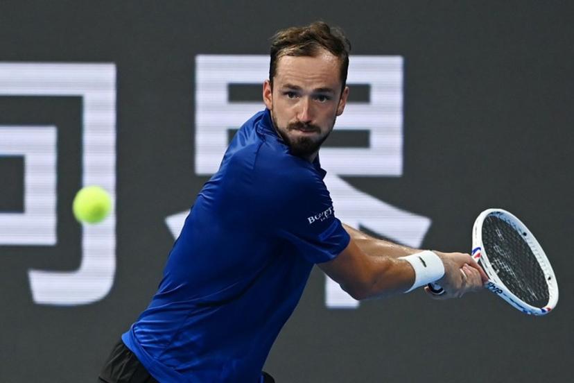 Russia's Daniil Medvedev hits a return to Russia's Roman Safiullin during their men's singles semi-final match at the Hangzhou Open tennis tournament in Hangzhou, in China's eastern Zhejiang province on September 28, 2026. AFP