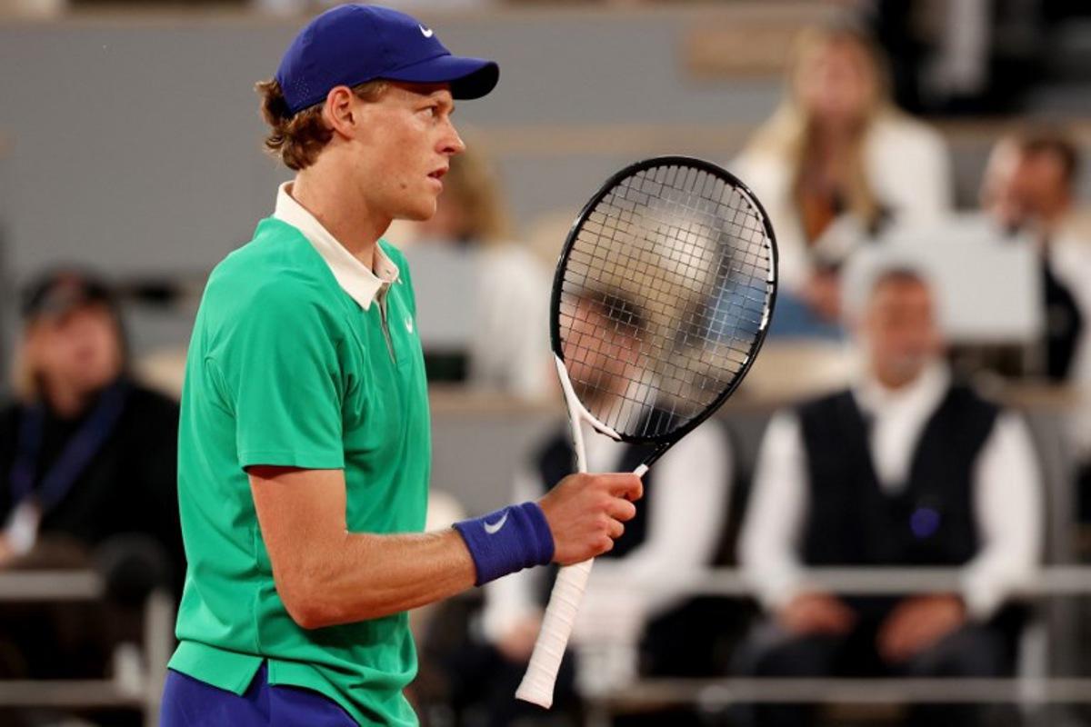 Italy's Jannik Sinner reacts during his men's singles match against Russia's Andrey Rublev on day 9 of the French Open tennis tournament on Court Philippe-Chatrier at the Roland-Garros Complex in Paris on June 2, 2025. ALAIN JOCARD / AFP