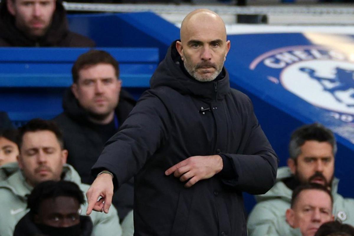 Chelsea's Italian head coach Enzo Maresca gestures on the touchline during the English Premier League football match between Chelsea and Everton at Stamford Bridge in London on December 13, 2025. Adrian Dennis / AFP