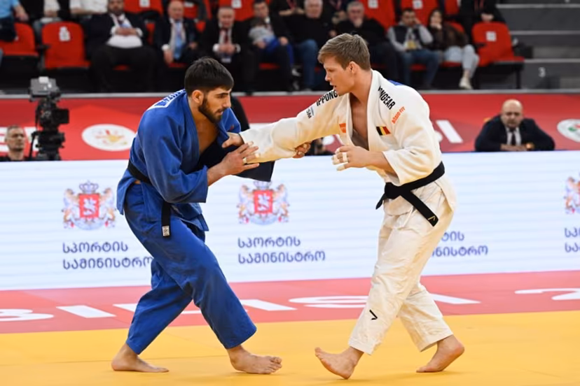 Belgium's Matthias Casse (white) competes against Georgia's Dimitri Gochilaidze in the men's under 81 kg bronze medal bout at the Tbilisi Grand Slam judo tournament in Tbilisi on March 21, 2026. Vano SHLAMOV / AFP