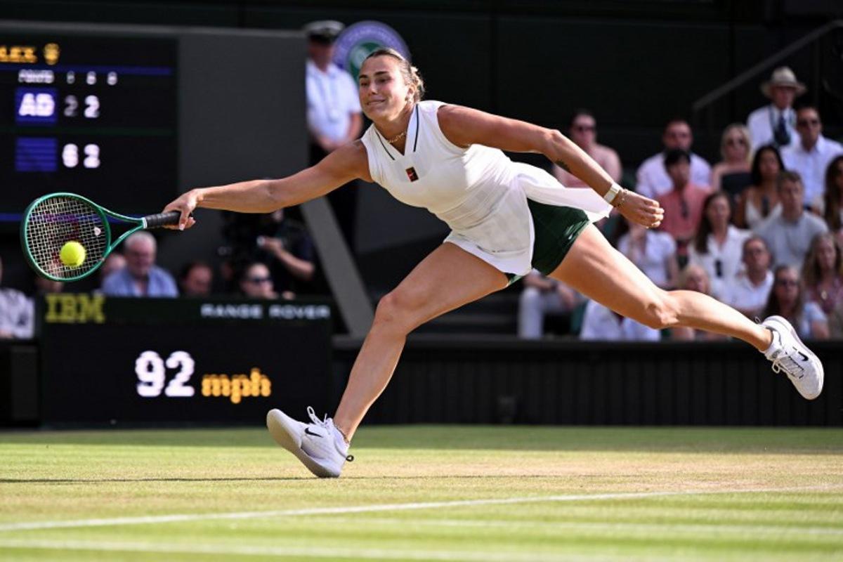 Belarus's Aryna Sabalenka returns to Japan's Naomi Osaka during their women's singles round of 16 tennis match on the seventh day of the 2026 Wimbledon Championships at The All England Lawn Tennis and Croquet Club in Wimbledon, southwest London, on July 5, 2026. Kirill KUDRYAVTSEV / AFP