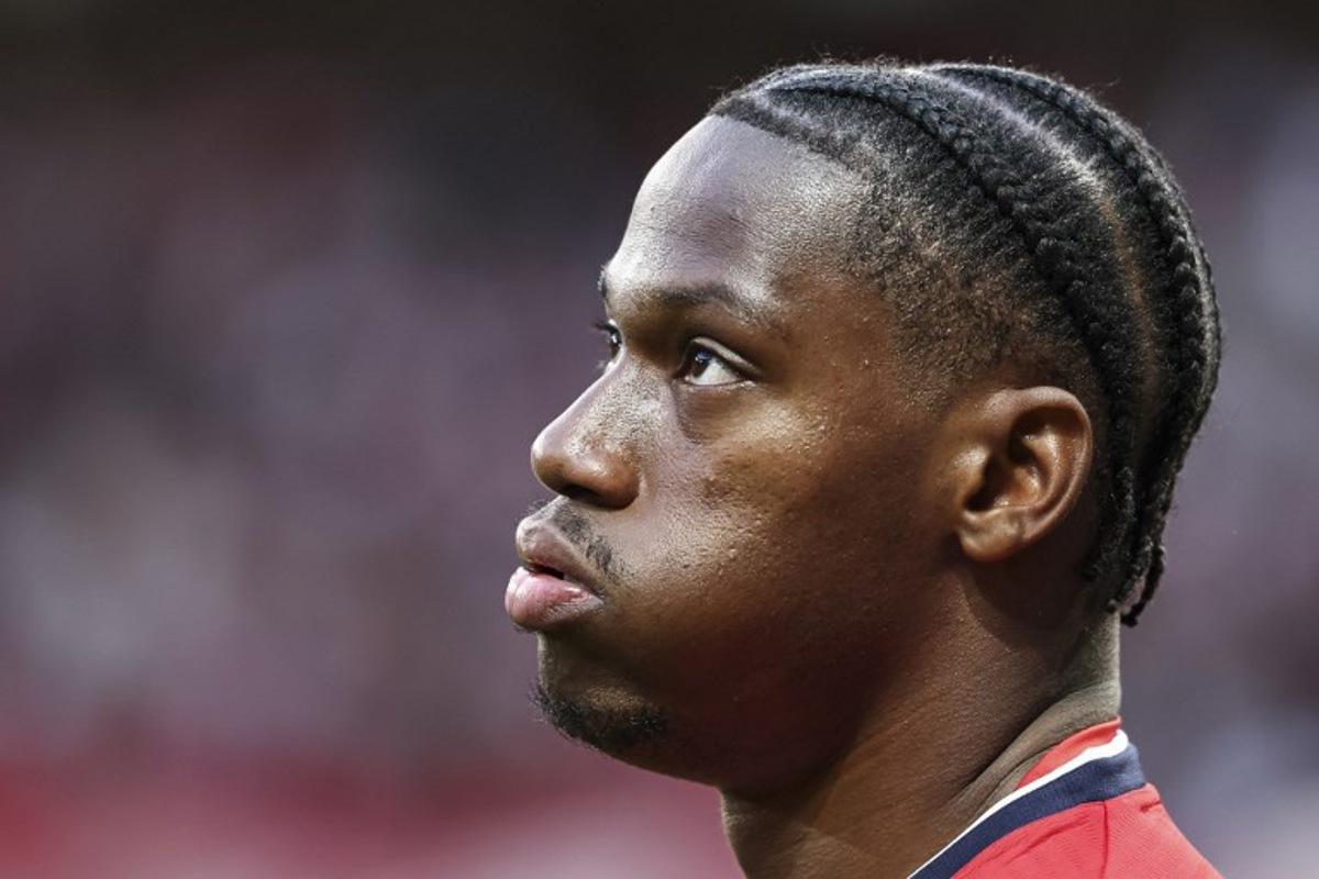 Lille's Canadian forward #09 Jonathan David looks on ahead of the French L1 football match between Lille (LOSC) and Olympique de Marseille (OM) at the Pierre-Mauroy stadium in Villeneuve-d'Ascq, northern France, on May 4, 2025. Sameer Al-DOUMY / AFP