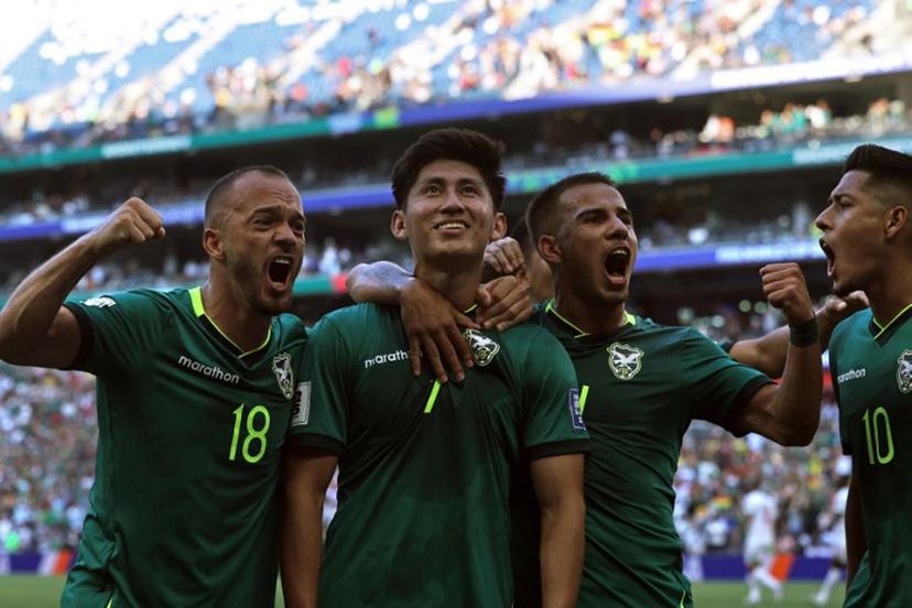 Bolivia's forward #07 Miguel Terceros (2nd L) celebrates with teammates midfielder #18 Juan Godoy (L), midfielder #14 Robson Matheus and forward #10 Ramiro Vaca after scoring a penalty kick during the 2026 FIFA World Cup qualifiers semi-final playoff football match between Bolivia and Suriname at the BBVA Stadium in Guadalupe, Mexico on March 26, 2026. Julio Cesar AGUILAR / AFP