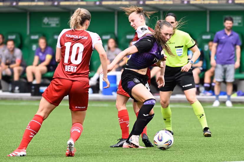 Essevee's Amber Bert, Anderlecht's Rimante Jonusaite and Zulte's Lisa Vanhentenrijk pictured in action during a soccer game between RSC Anderlecht and Zulte Waregem, the final of the Belgian soccer cup, Saturday 30 May 2026, in La Louviere. BELGA PHOTO JILL DELSAUX