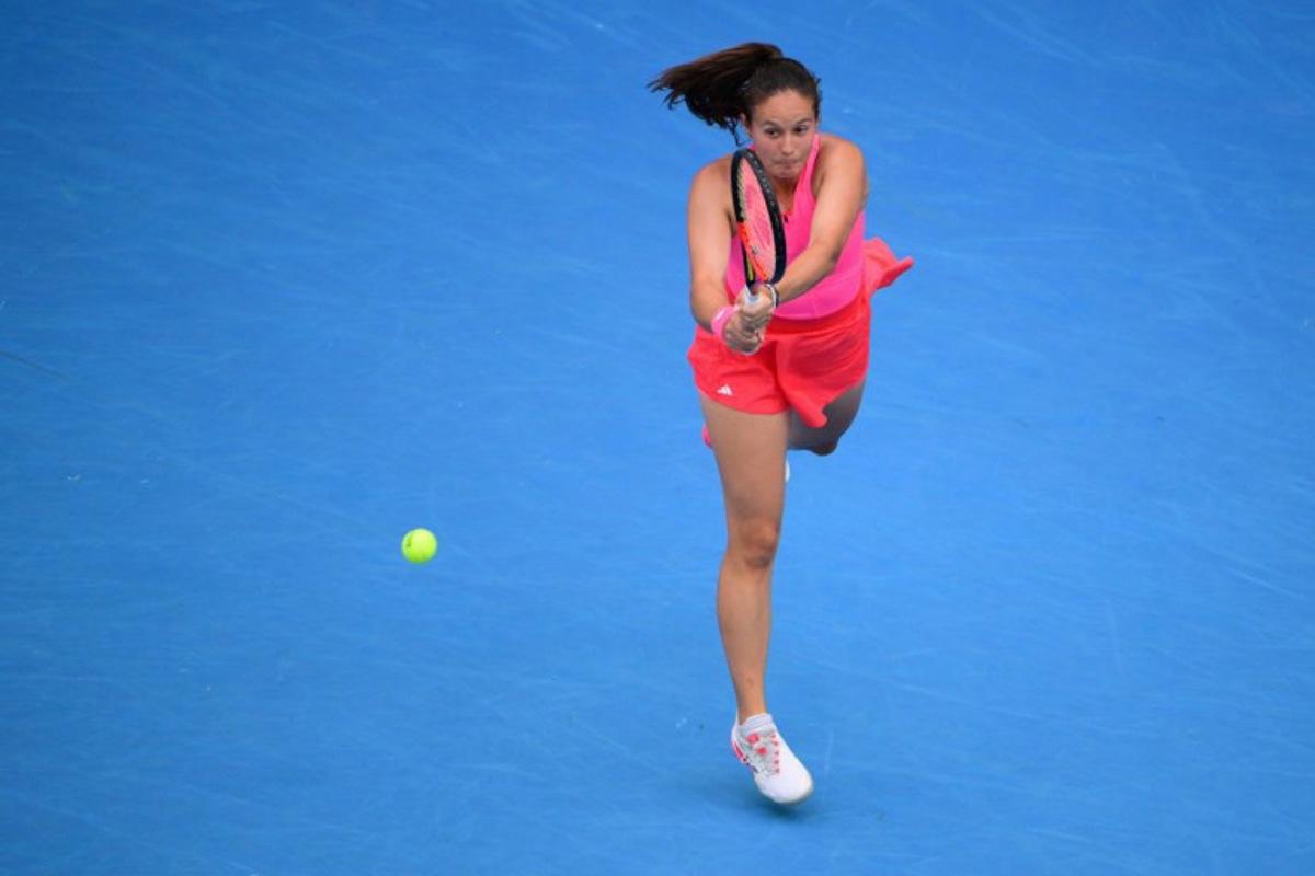 Russia's Daria Kasatkina hits a return against USA's Emma Navarro during their women's singles match on day nine of the Australian Open tennis tournament in Melbourne on January 20, 2025. Yuichi YAMAZAKI / AFP