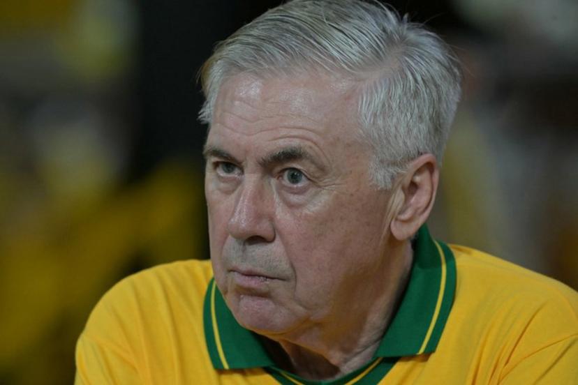 Brazil's Italian head coach Carlo Ancelotti gestures while attending the second night of carnival parade in the Sambadrome in Sao Paulo, Brazil, on February 14, 2026. NELSON ALMEIDA / AFP
